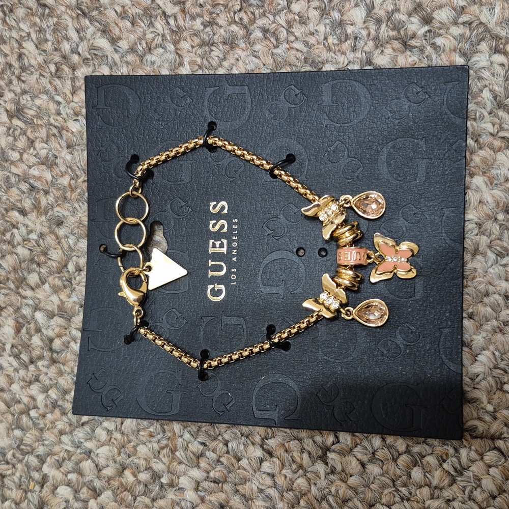 GUESS Gold and Pink Butterfly Charm Bracelet NWOT